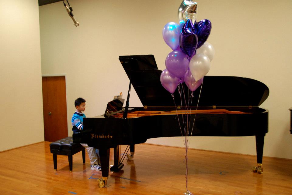 playathon 4 boy playing piano