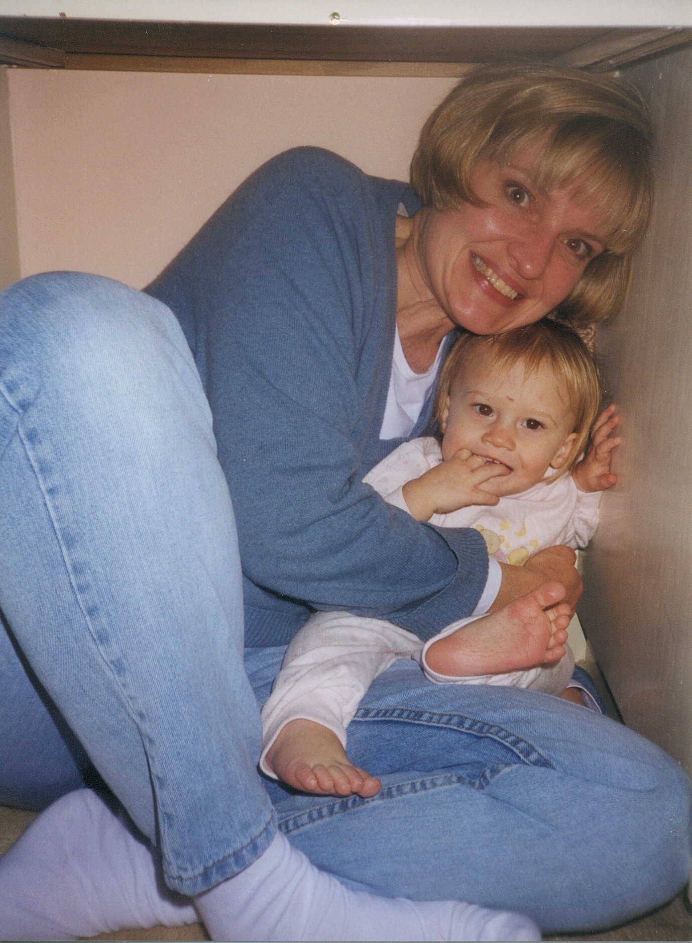 Mom and Taylor under the counter Mom and Taylor under the counter