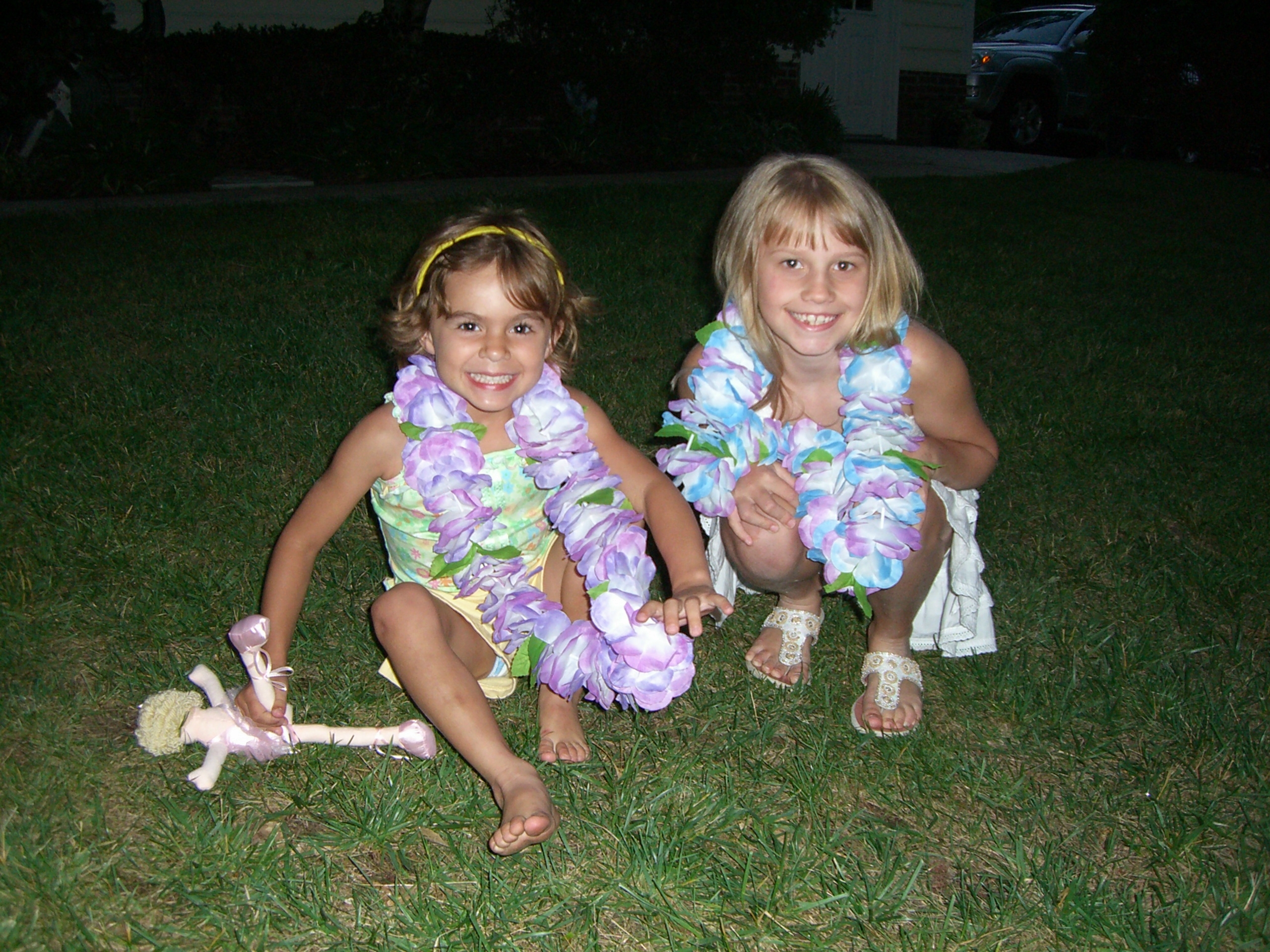CIMG0468 Taylor and Morgan in leis